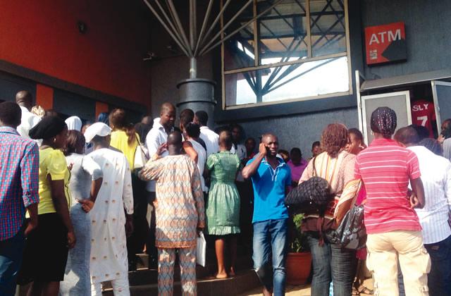 Customers-waiting-for-revalidation-of-their-Bank-Verification-Numbers-at-a-bank-branch-at-Awori-on-Lagos-Abeokuta-Expressway-Lagos...-on-Tuesday