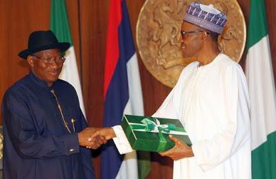 Nigerian-President-Muhammadu-Buhari-right-shakes-hands-with-former-Nigerian-President-Goodluck-Jonathan.-Source-AFP-Getty-Images-650x420